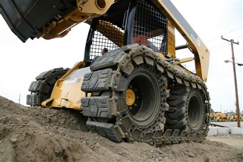 rubber tracks versus tires skid steer loader for clearing trees|solideal skid steer tracks.